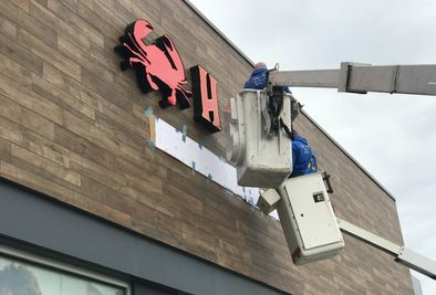 signage production and installation company Genesis Signs